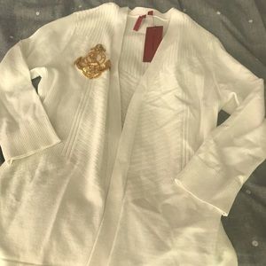 White sweater with anchor